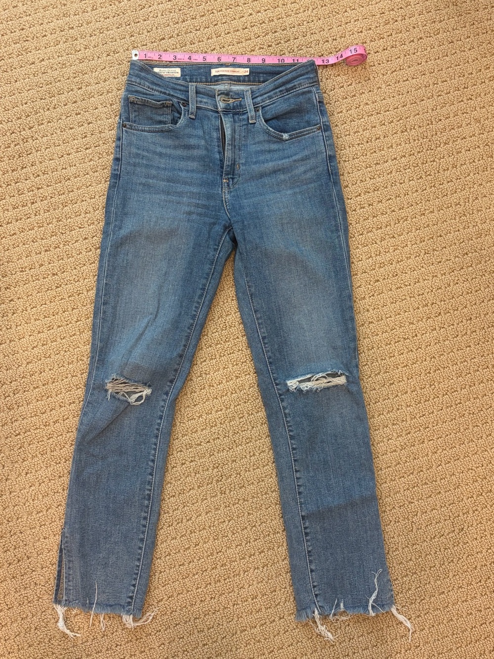 Levi’s - Women's Classic Blue distressed raw hem jeans (Size 24)